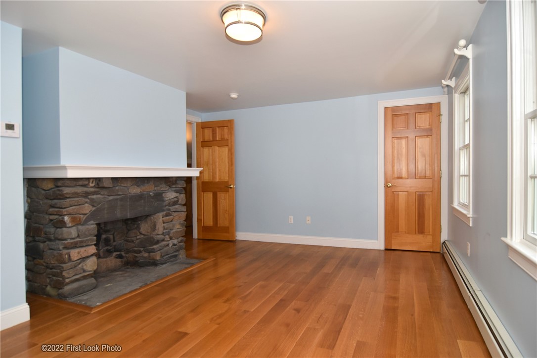 1010 Ten Rod Road North Kingstown, RI 02852 - Photo 18 of 27 Guest Bedroom with Fireplace