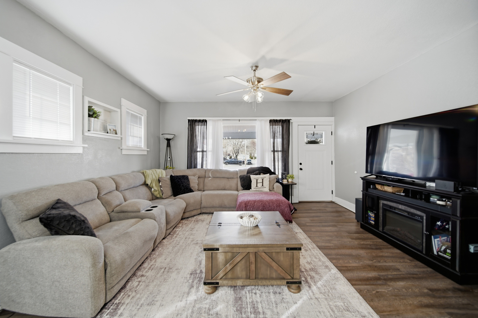 624 Palmyra Street Dixon, IL 61021 - Photo 12 of 29 a living room with furniture and a flat screen tv