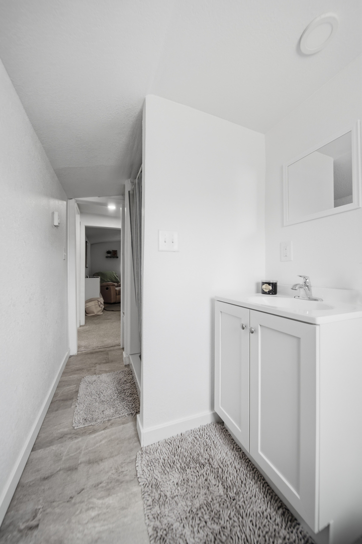 624 Palmyra Street Dixon, IL 61021 - Photo 26 of 29 a view of a hallway to a bedroom and a bathroom