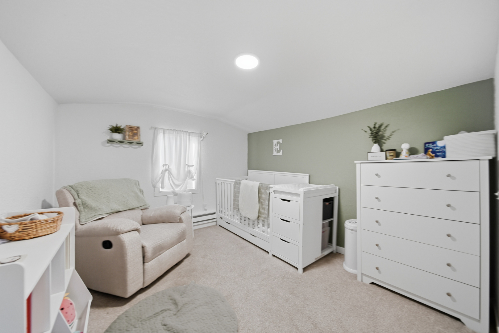 624 Palmyra Street Dixon, IL 61021 - Photo 27 of 29 a living room with furniture and baby crib