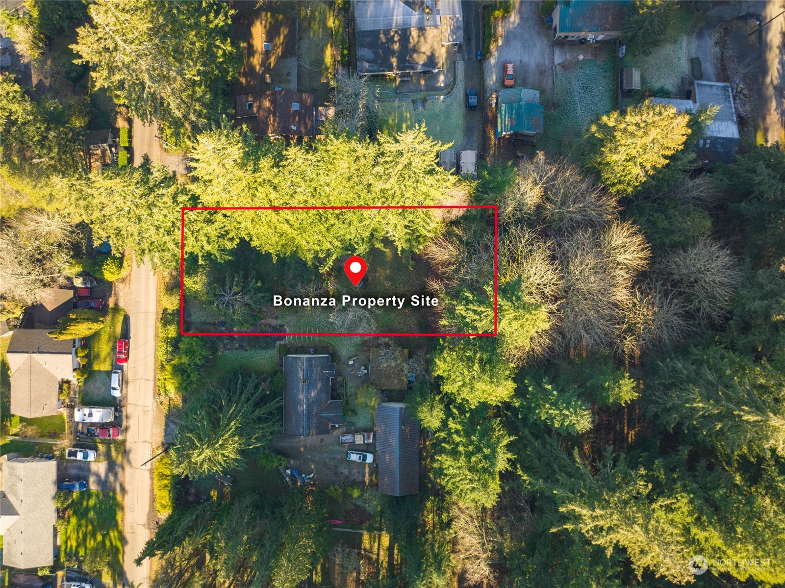 0 Bonanza Way Bellingham, WA 98229 - Photo 3 of 14 a street sign that is in front of flowers