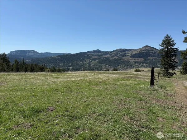 a view of a lake with mountains in the background