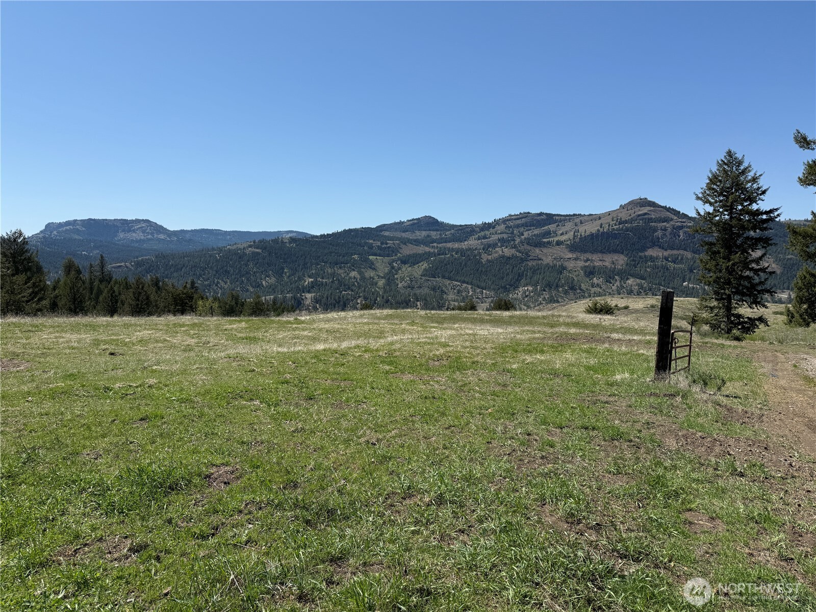 a view of a lake with mountains in the background
