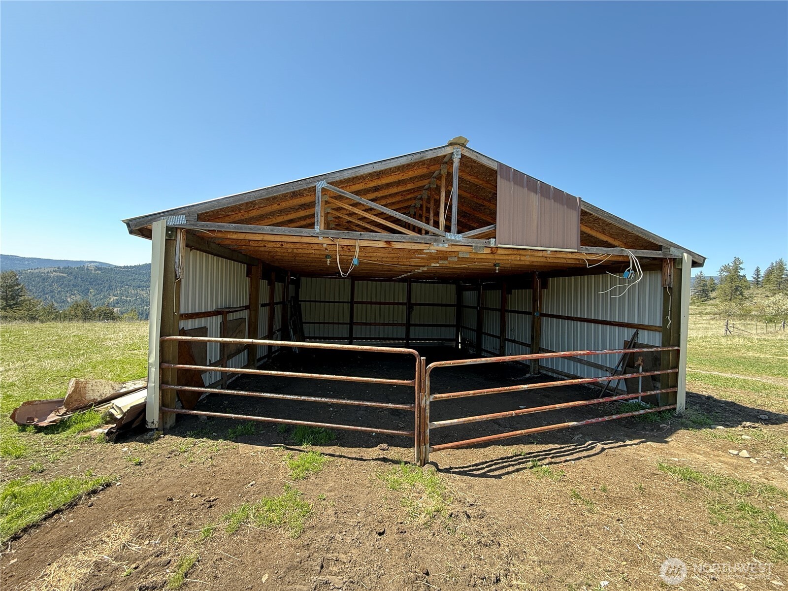 26 Grandview Road Curlew, WA 99118 - Photo 9 of 34 a front view of a house with a yard