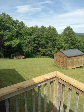 a view of a backyard with a garden