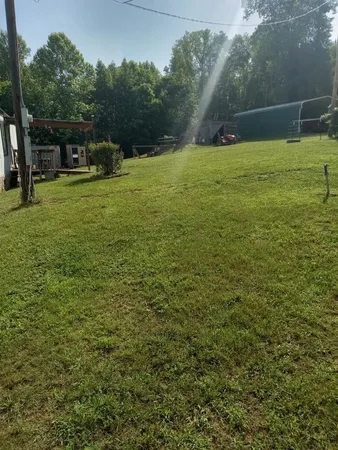 a view of outdoor space and yard