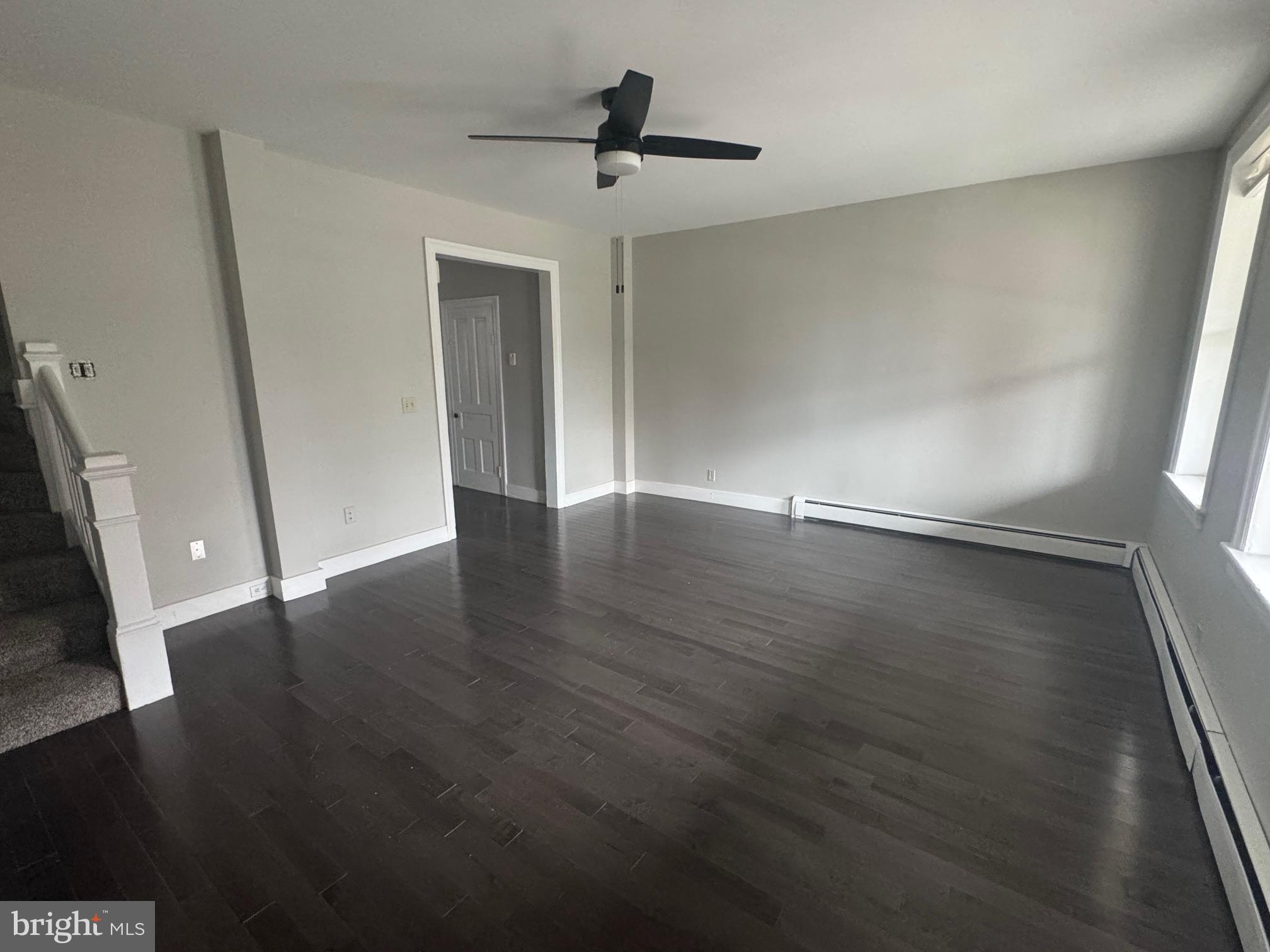 302 North Stratton Street Gettysburg, PA 17325 - Photo 4 of 15 wooden floor in an empty room with a window
