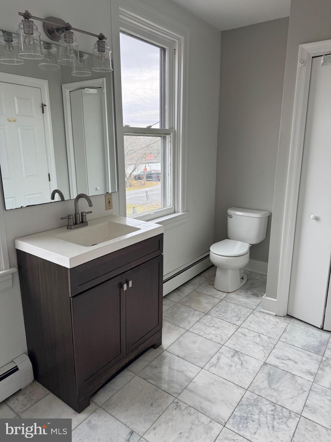 302 North Stratton Street Gettysburg, PA 17325 - Photo 10 of 15 a bathroom with a sink and a toilet