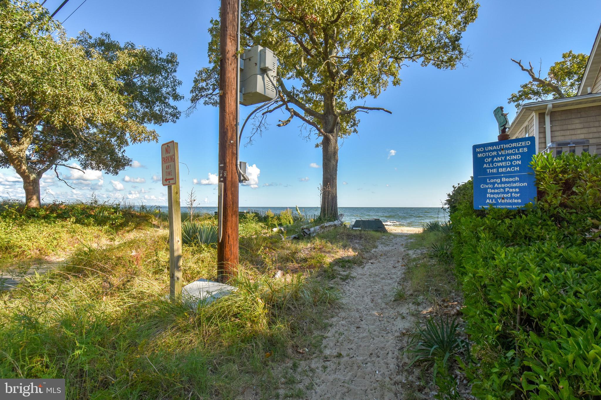 6041 Hill Road St. Leonard, MD 20685 - Photo 14 of 17 a yard with lots of green space