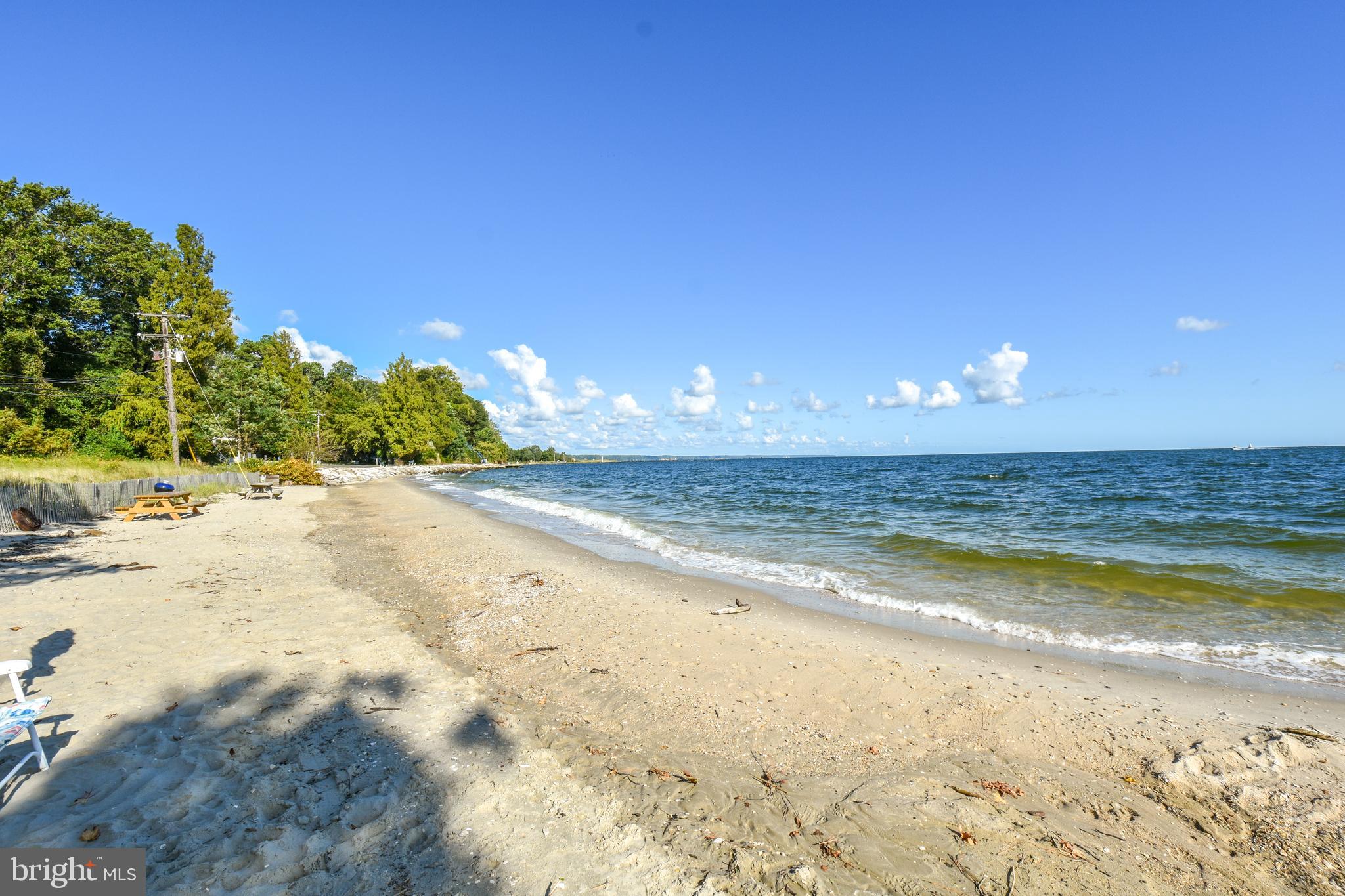 6041 Hill Road St. Leonard, MD 20685 - Photo 16 of 17 a view of a swimming pool with an outdoor space