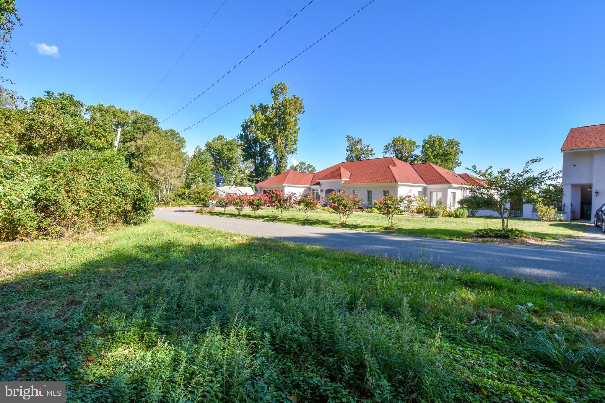 6041 Hill Road St. Leonard, MD 20685 - Photo 4 of 17 a view of swimming pool with outdoor seating and yard