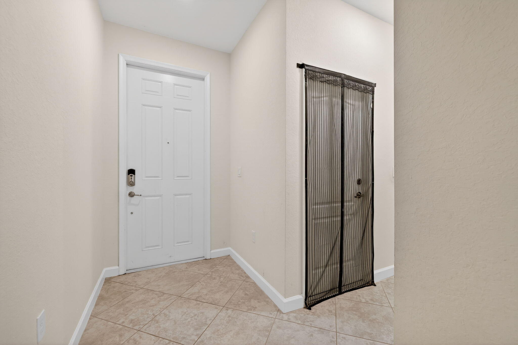 9504 Southwest Otter Lane Stuart, FL 34997 - Photo 13 of 36 an empty room with closet