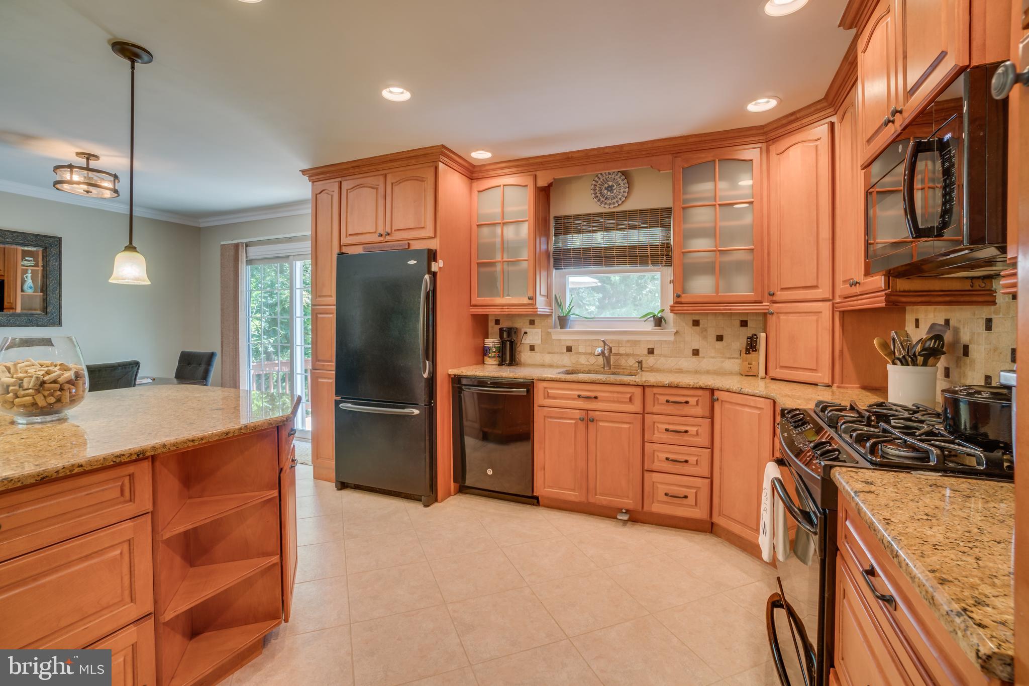 3900 Flagstone Terrace Alexandria, VA 22306 - Photo 3 of 45 Custom Omega Cabinetry and granite counters