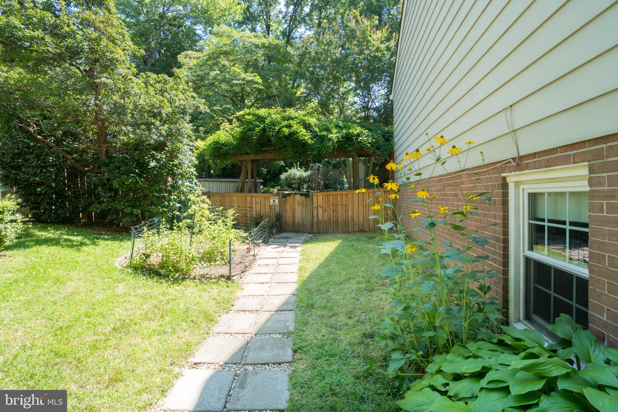 3900 Flagstone Terrace Alexandria, VA 22306 - Photo 40 of 45 Paver walkway around house.