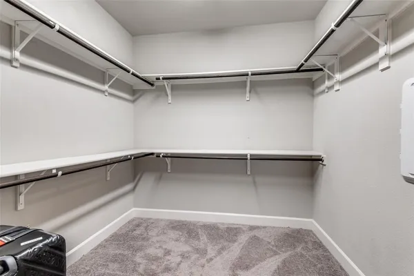 a bathroom with a bathtub and a sink