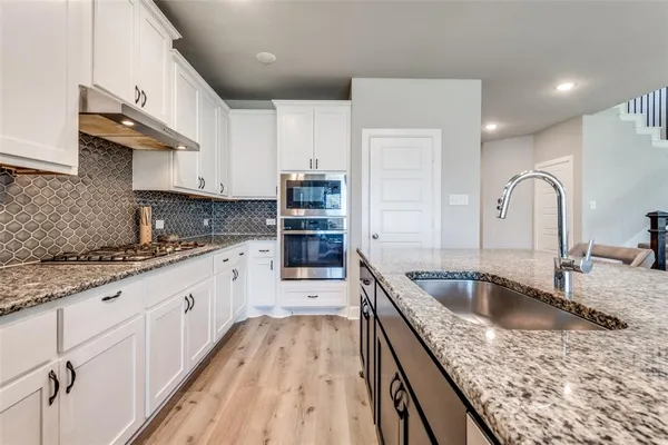 a workspace with furniture and a window