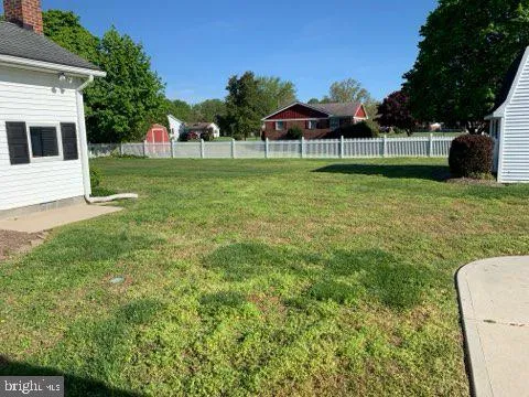 a view of a backyard with a garden