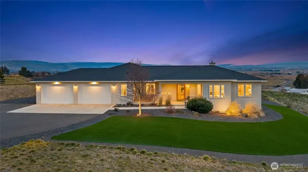 a view of a swimming pool with an outdoor seating