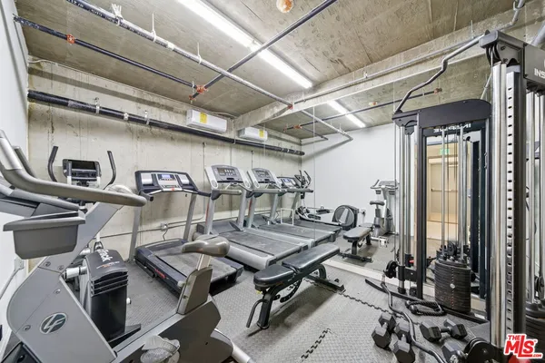 a view of a room with gym equipment