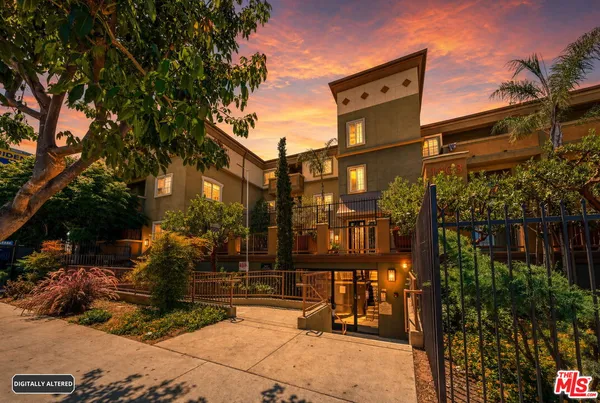 a view of buildings with a outdoor space