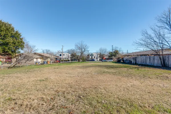 a swimming pool with wooden fence