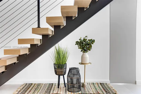 a bedroom with a bed and a tv