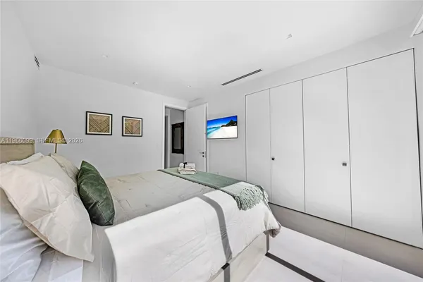 a view of an house with swimming pool yard and outdoor seating