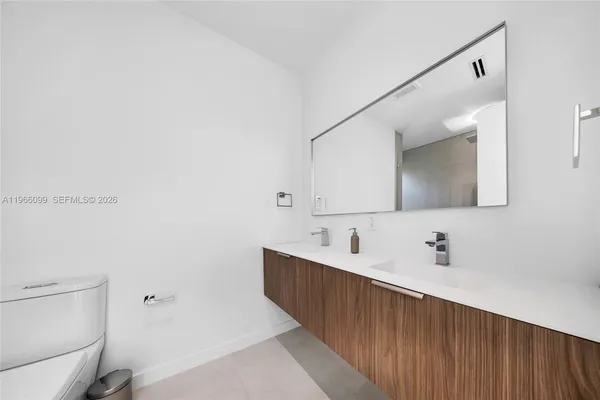 a view of swimming pool with a patio