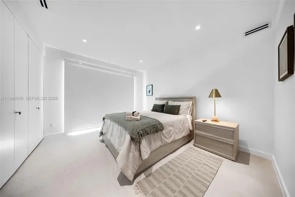 a view of house with a chairs and table in patio