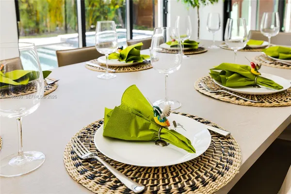 a kitchen with a sink and large window