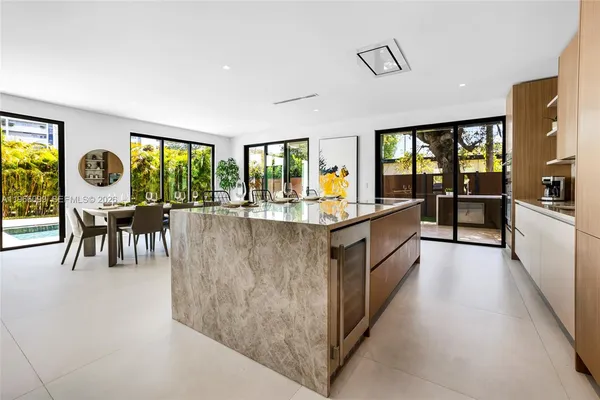 a view of kitchen with wooden floor