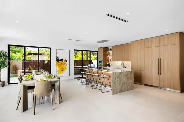 a living room with furniture and window