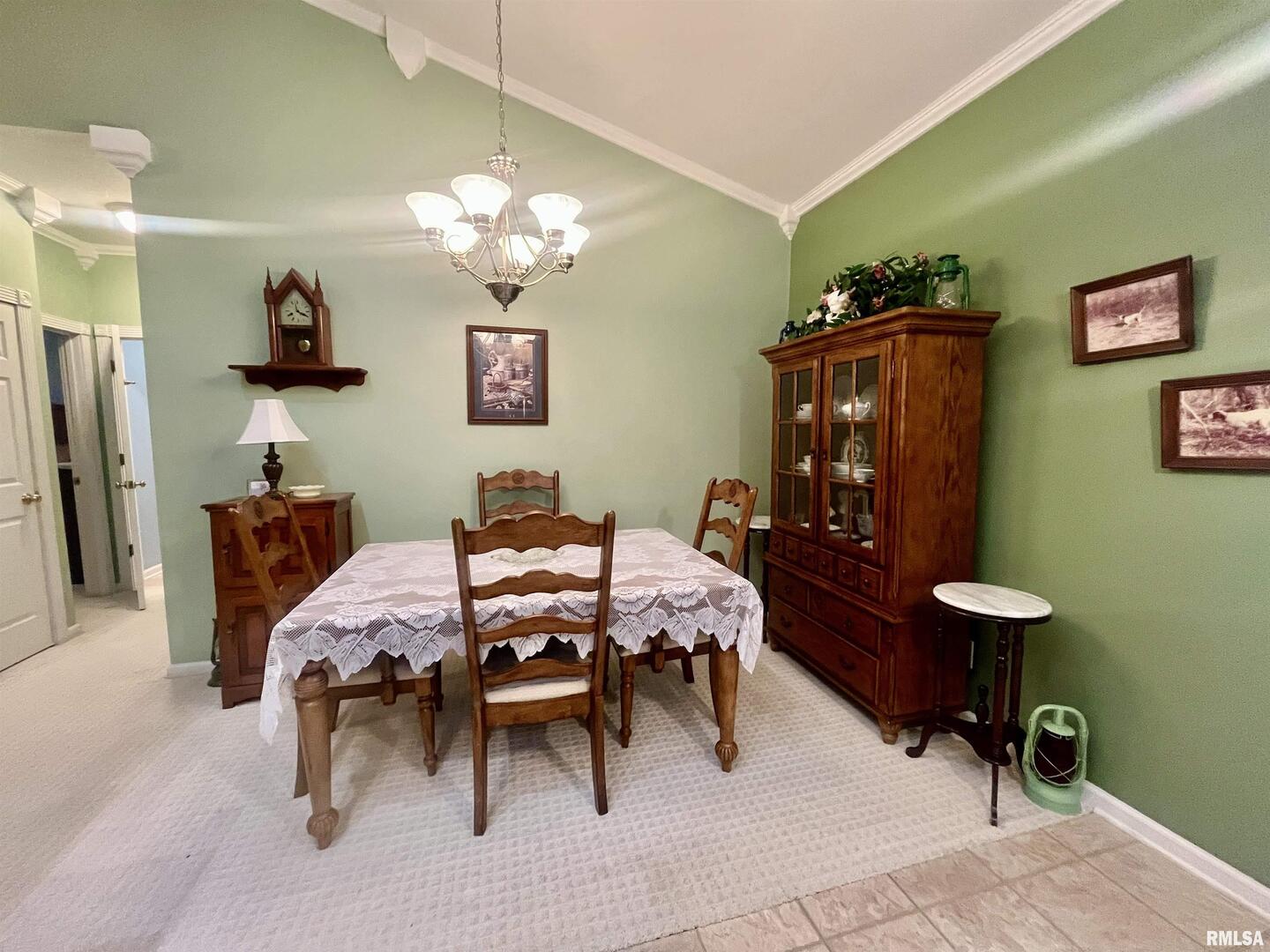 3220 Massac Creek Road Metropolis, IL 62960 - Photo 17 of 76 a view of a livingroom with furniture and a potted plant
