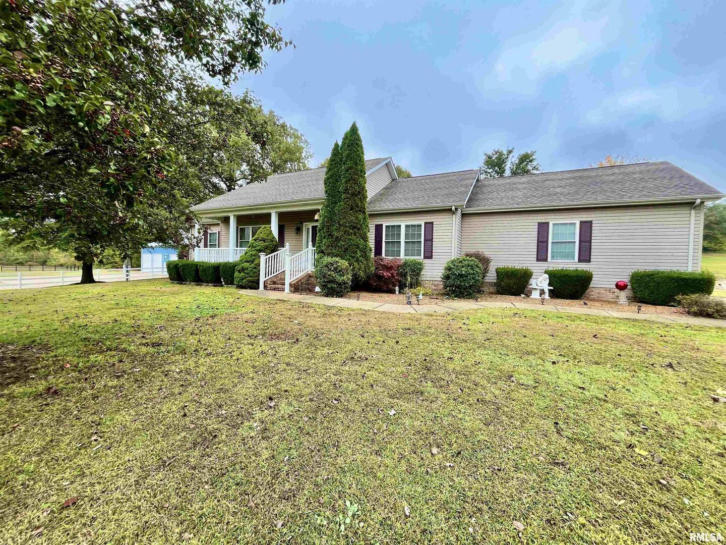 3220 Massac Creek Road Metropolis, IL 62960 - Photo 2 of 76 a front view of house with yard and green space