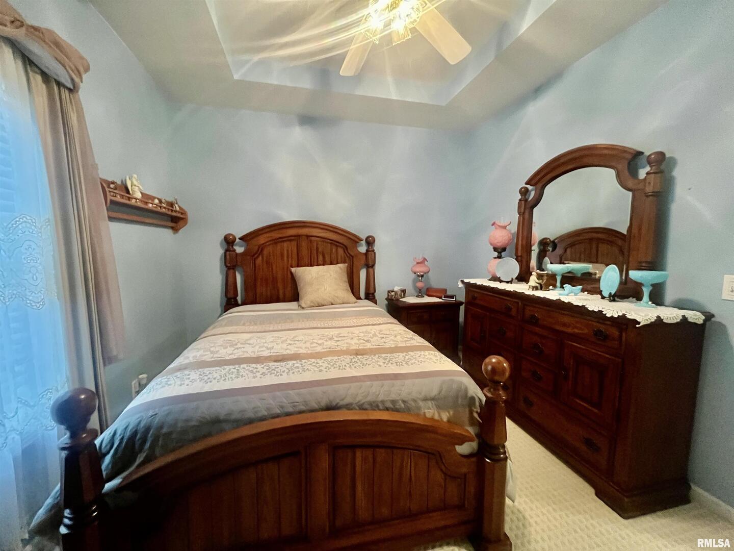 3220 Massac Creek Road Metropolis, IL 62960 - Photo 29 of 76 a bedroom with a bed and a dresser