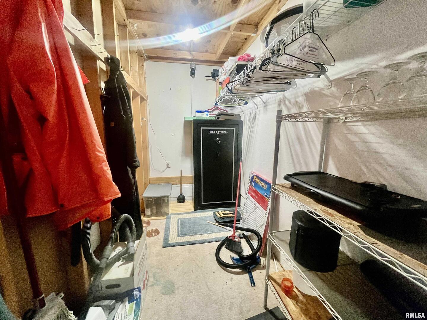 3220 Massac Creek Road Metropolis, IL 62960 - Photo 38 of 76 a view of walk in closet with clothes and shoes