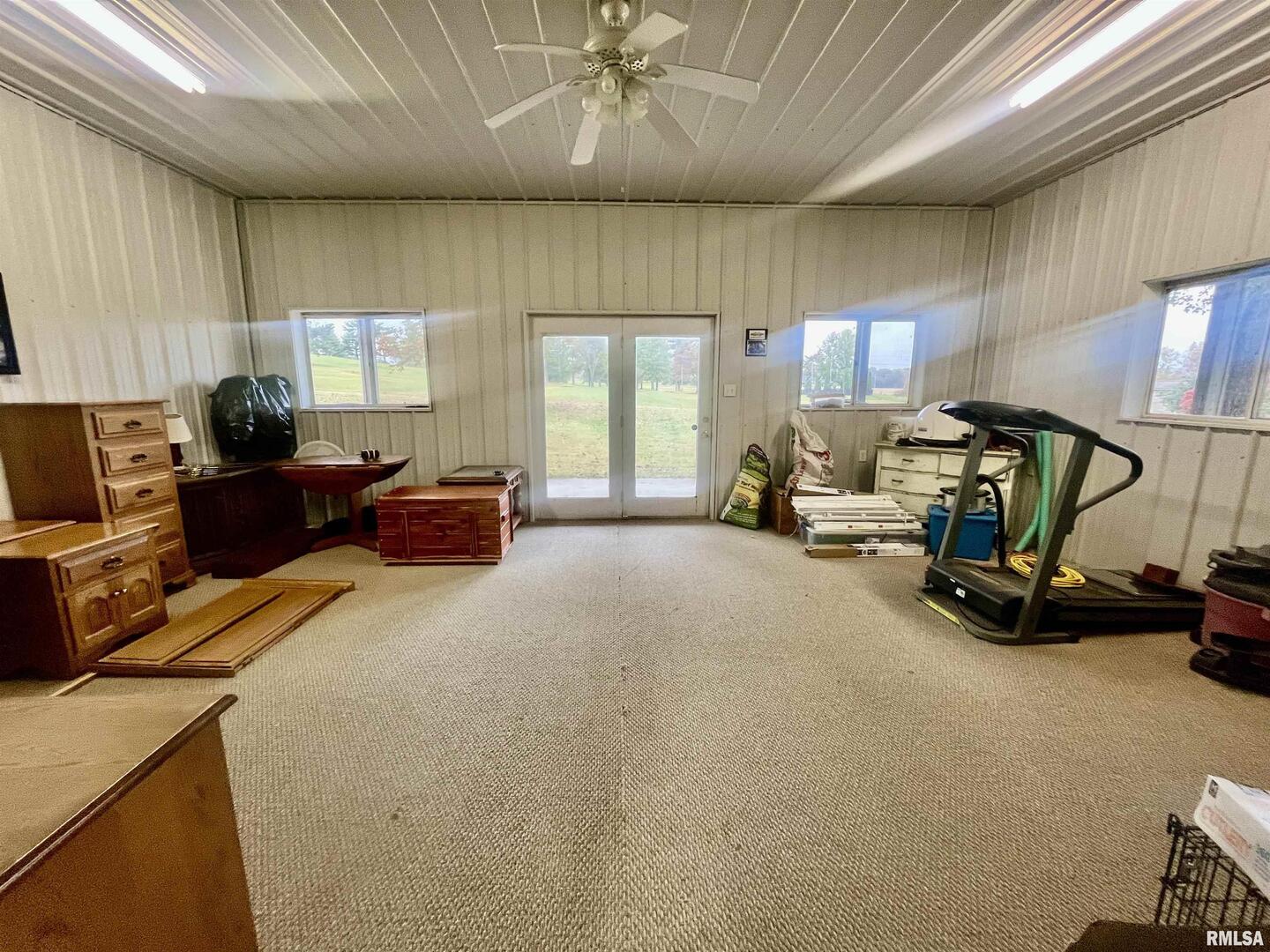 3220 Massac Creek Road Metropolis, IL 62960 - Photo 49 of 76 a room with gym equipment and a large window