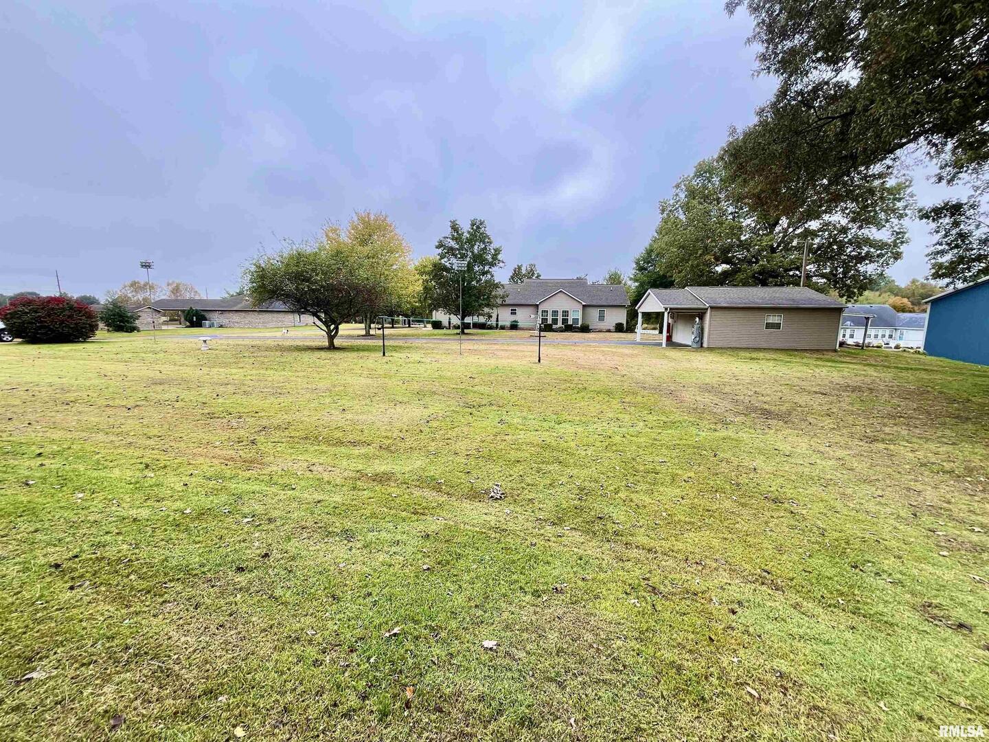 3220 Massac Creek Road Metropolis, IL 62960 - Photo 62 of 76 a swimming pool with an outdoor space and seating area