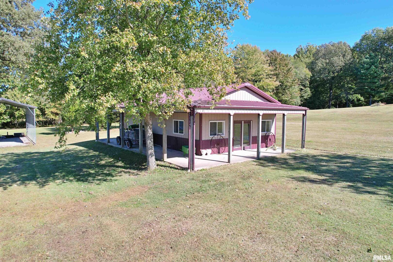 3220 Massac Creek Road Metropolis, IL 62960 - Photo 71 of 76 a front view of a house with garden