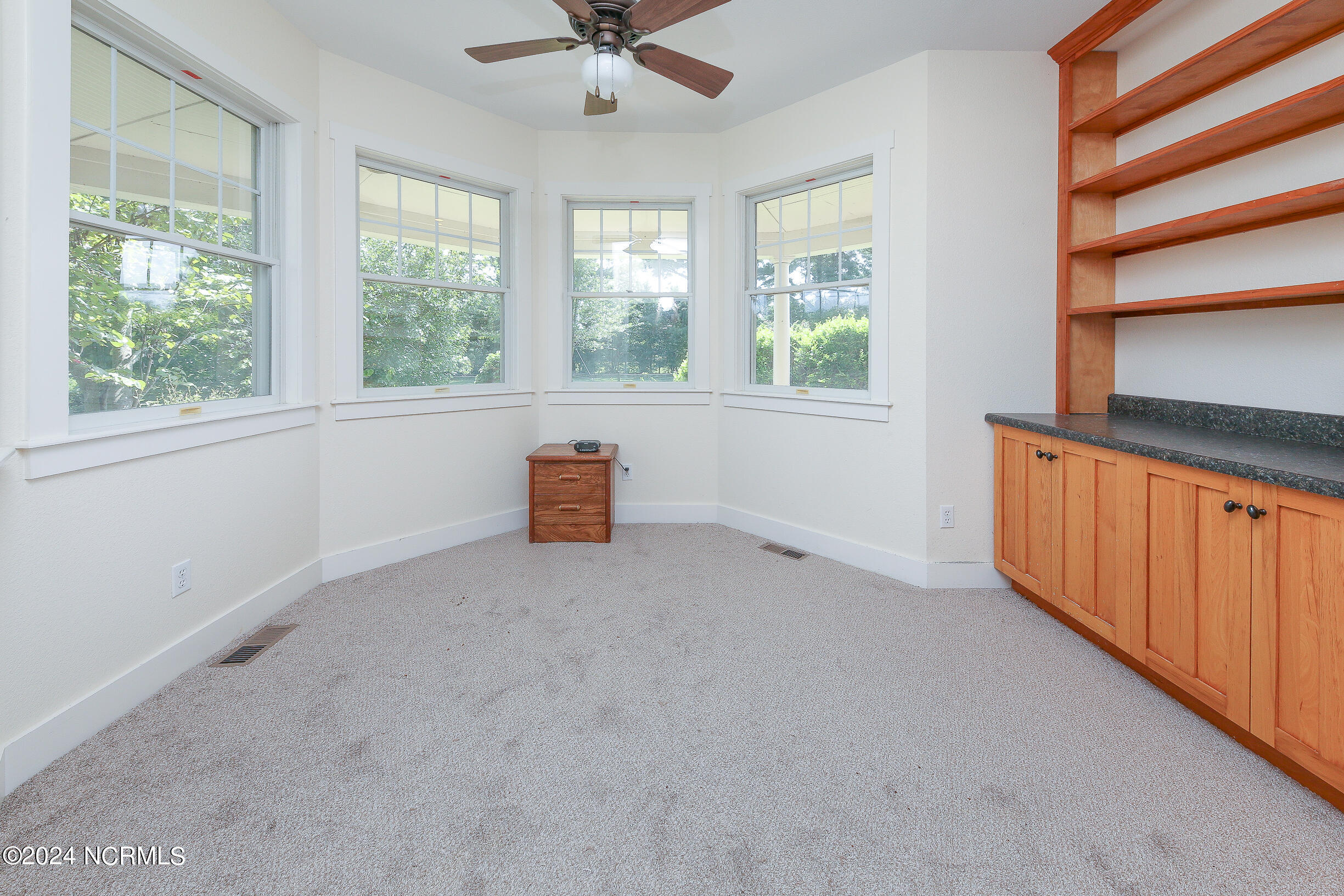 238 4 Forks Road Shawboro, NC 27973 - Photo 18 of 37 Downstairs study with double doors in the turret with new carpet