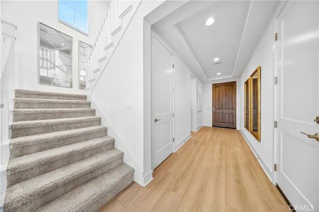 a view of staircase with white walls and white walls