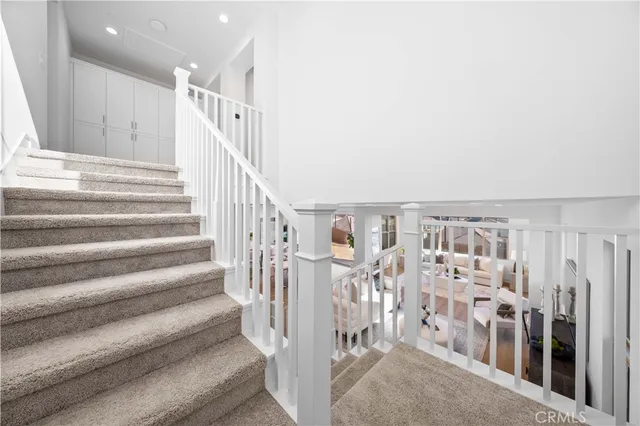 a bathroom with a double vanity sink and mirror