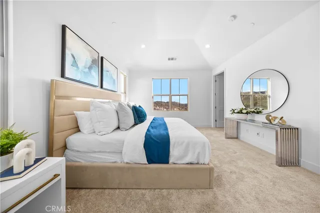 a bathroom with mirror and sink