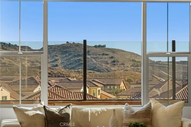 a front view of a house with large windows