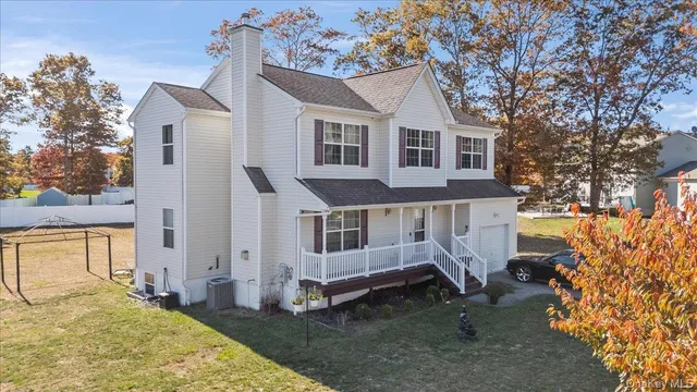 $685,000 | 64 East Margin Road, Ridge, NY 11961