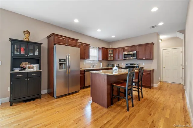 $685,000 | 64 East Margin Road, Ridge, NY 11961