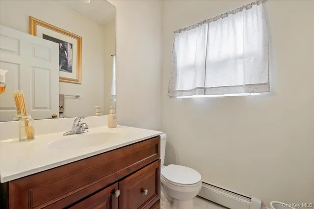 $685,000 | 64 East Margin Road, Ridge, NY 11961