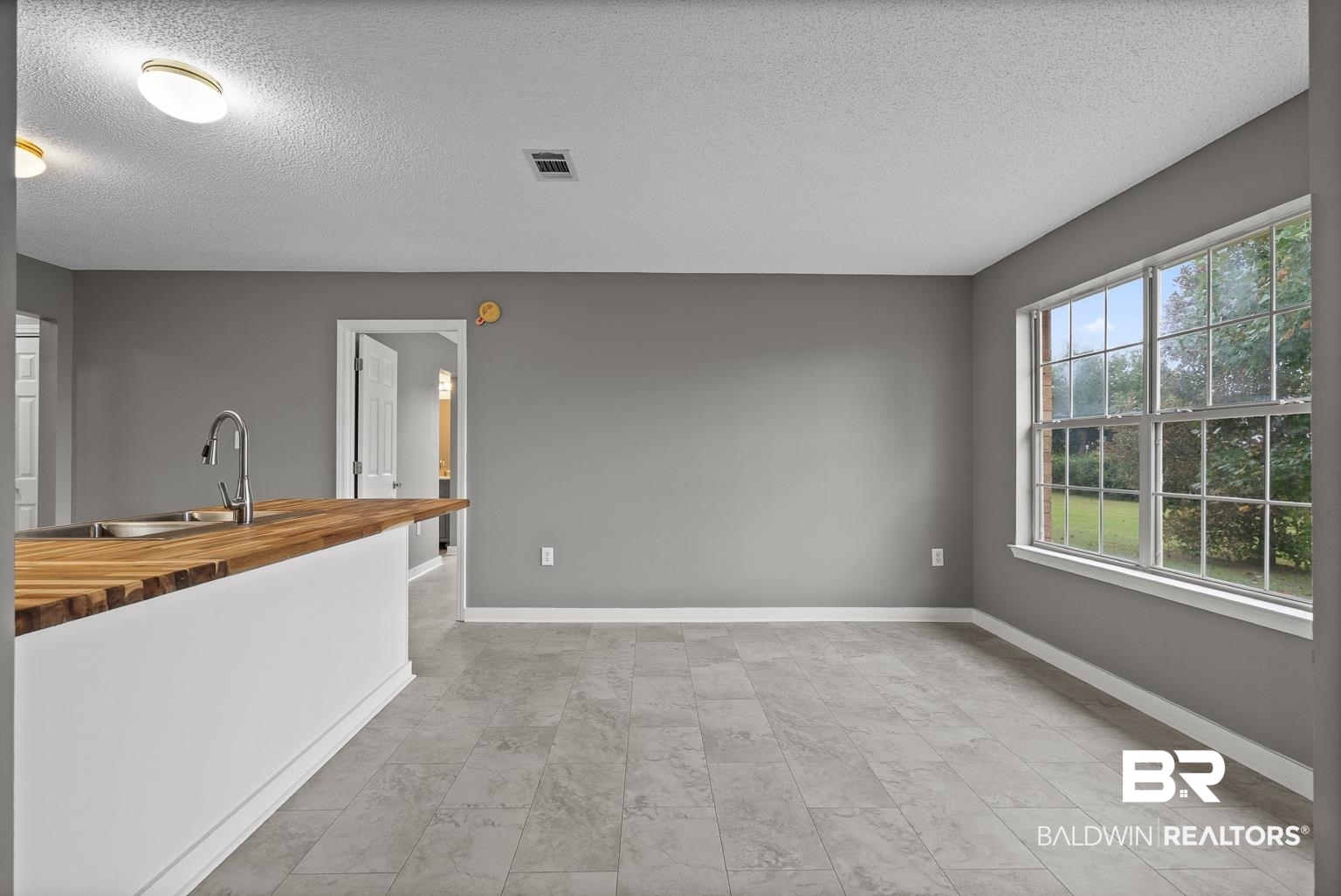 16418 Avent Lane Foley, AL 36535 - Photo 16 of 30 Interior space featuring a textured ceiling and sink