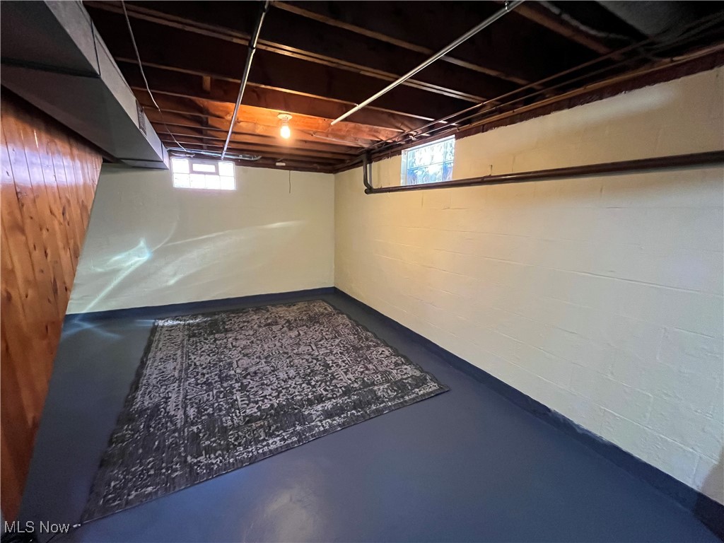 591 Ingalls Road Akron, OH 44312 - Photo 17 of 34 Lower Level Floor has just been painted