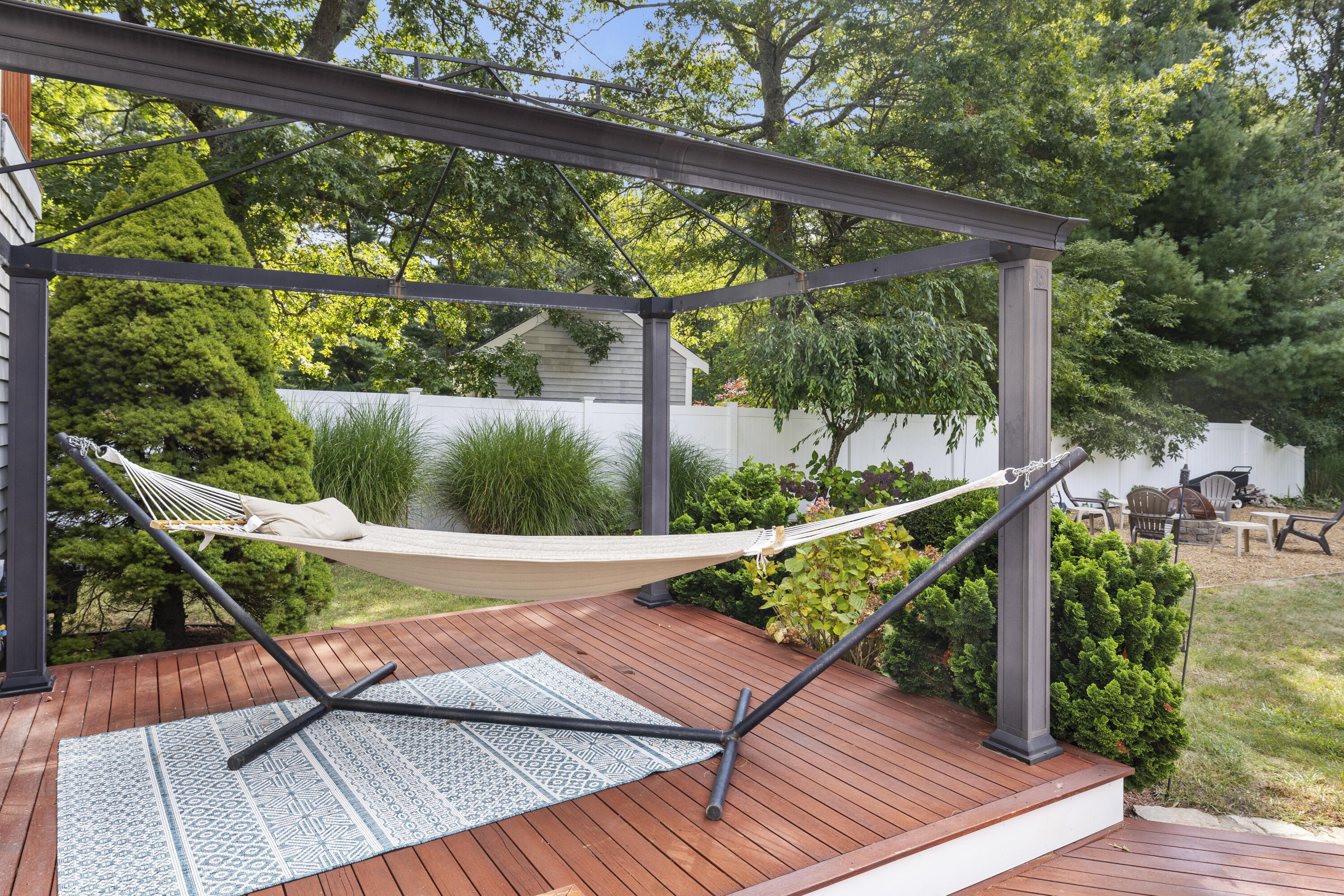 750 Old Barnstable Road Mashpee, MA 02649 - Photo 15 of 30 a view of a wooden deck with furniture